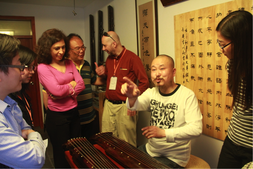 Learning how to play Gu Qin with a Gu Qin Master at the Zhong Nan college 